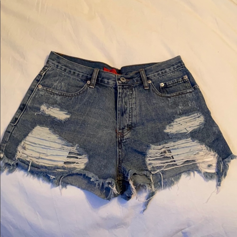 Destroyed denim shorts